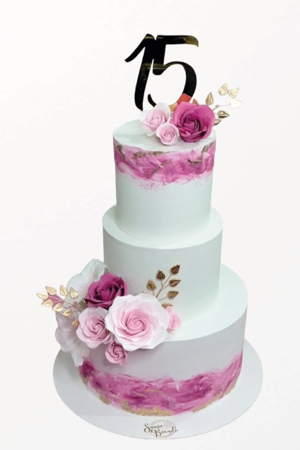 a cake with a number of flowers on it