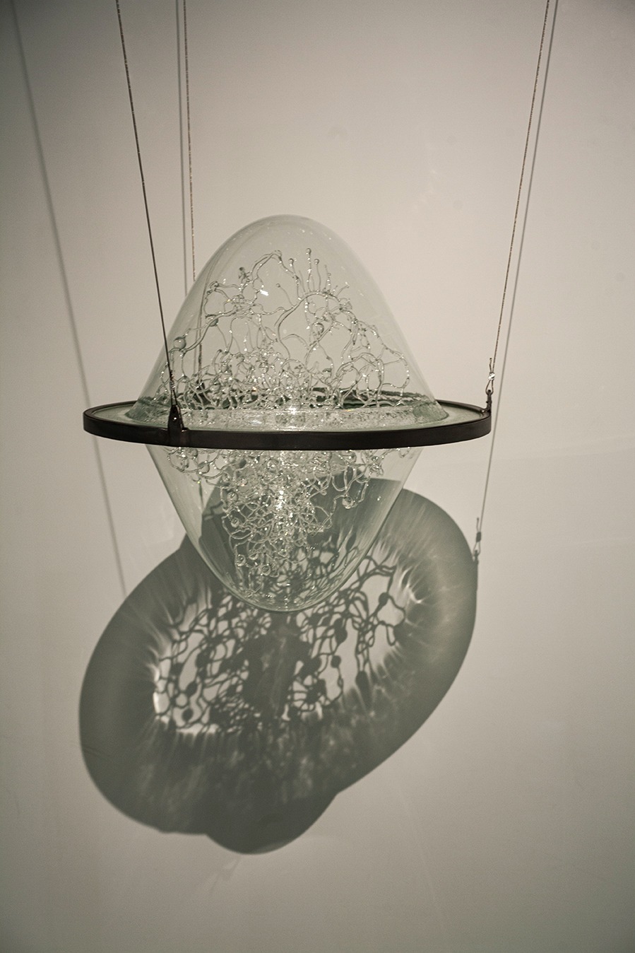 a glass sculpture in the air