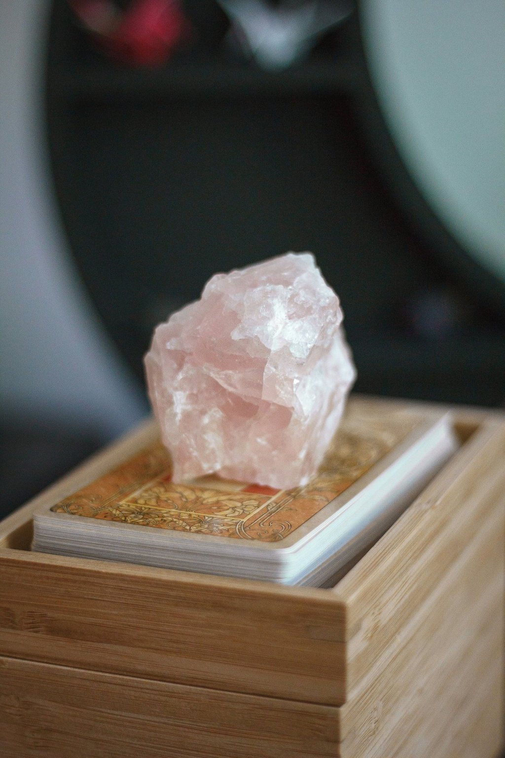 Crystal on tarot deck. Photo by Susanna Marsiglia on Unsplash.