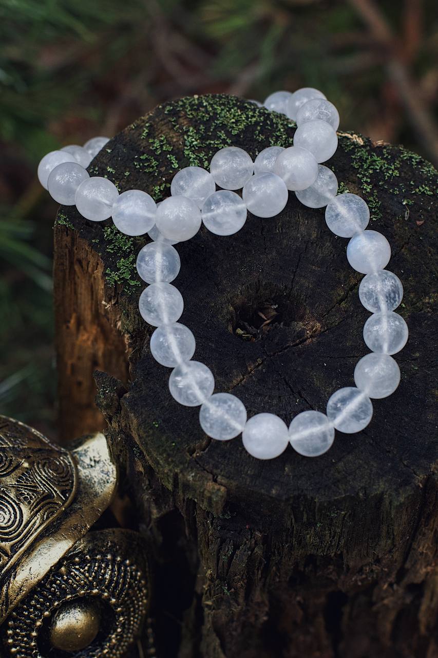 two bracelets on a stone