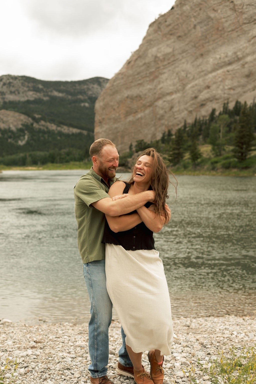 a man and woman standing next to each other