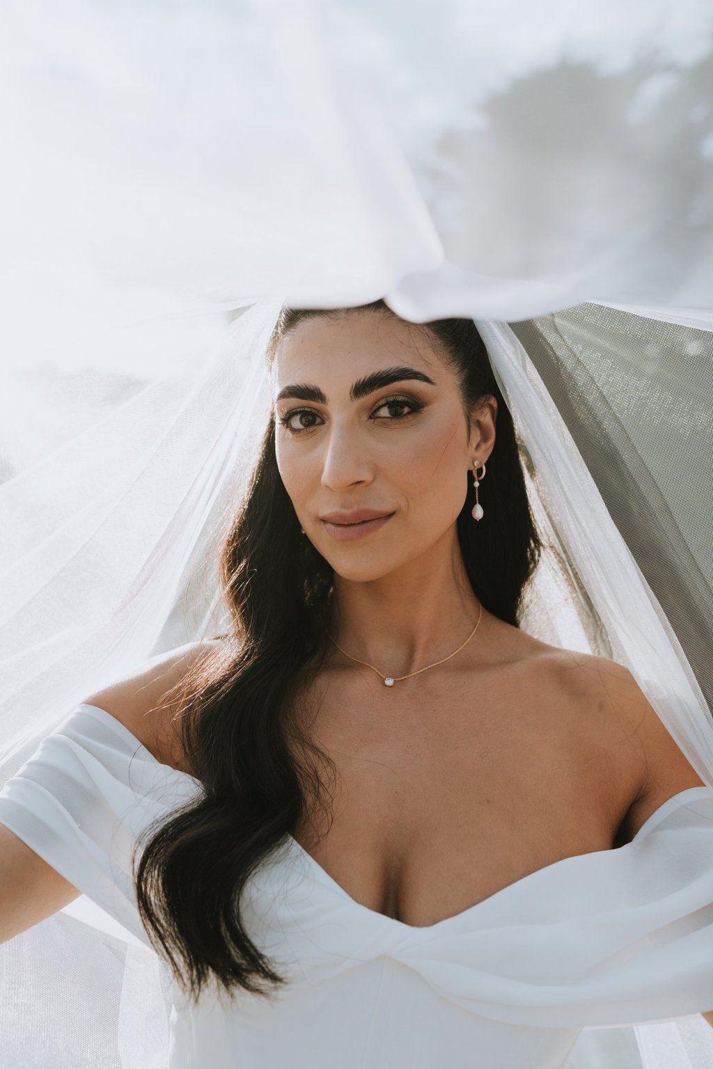 Beautiful bride with long dar glam waves