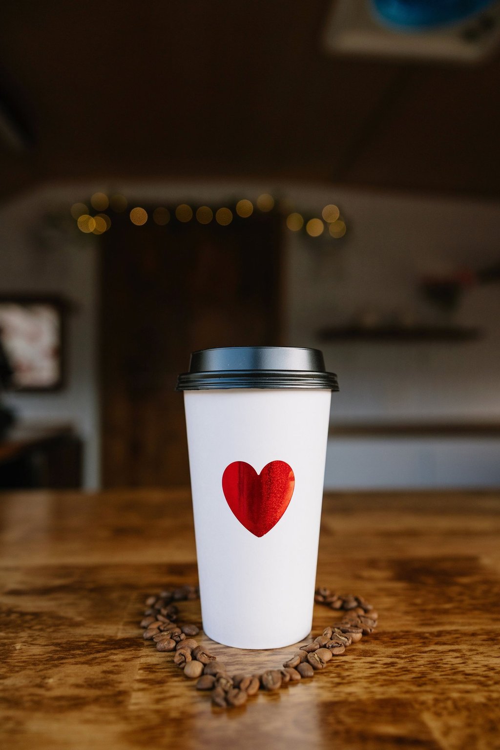 Love & Lattes Mobile serving drinks with love in vintage coffee trailer 