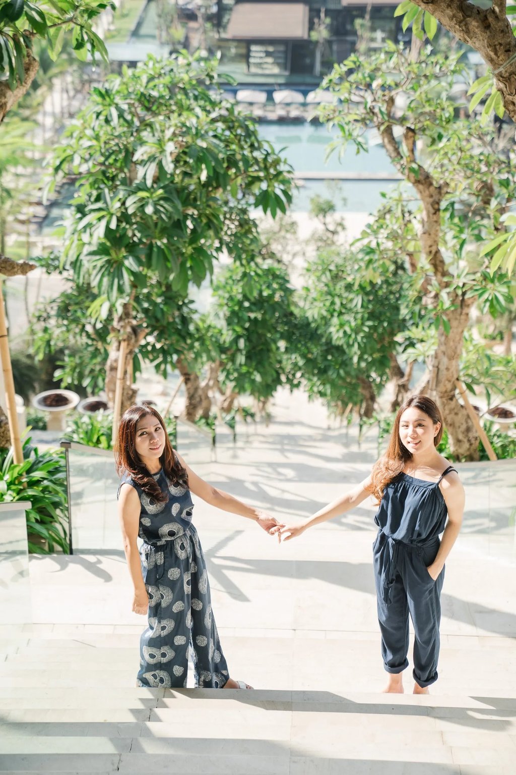 mother and daughter walking at kempinski bali nusa dua