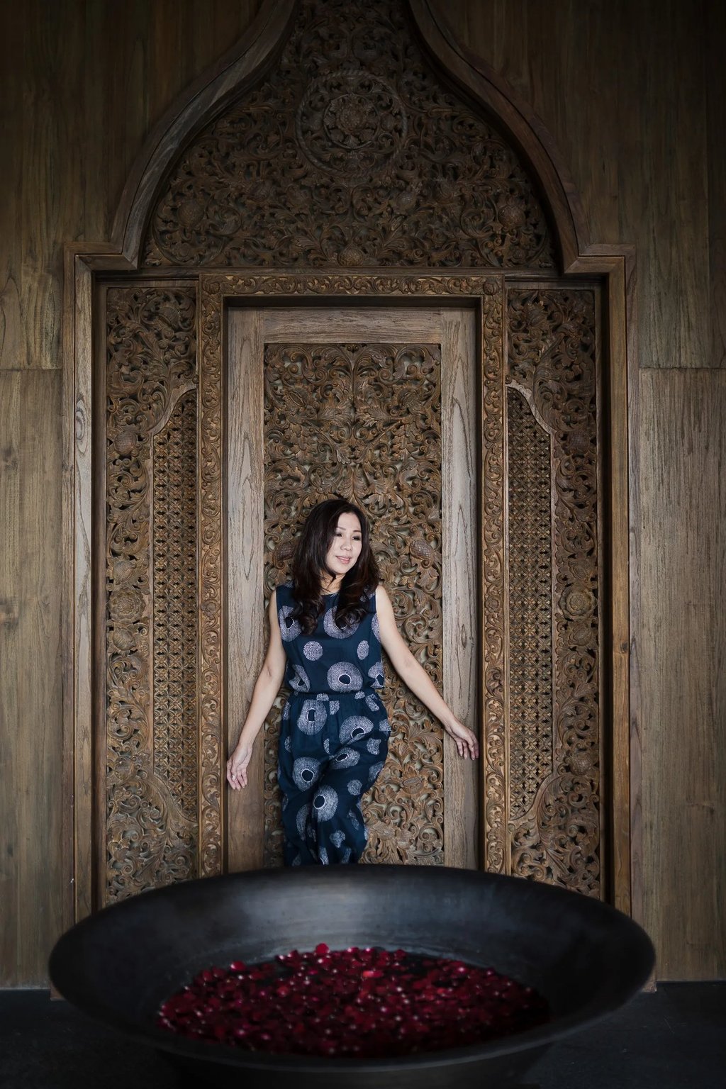 portrait with balinese architecture at kempinski bali nusa dua