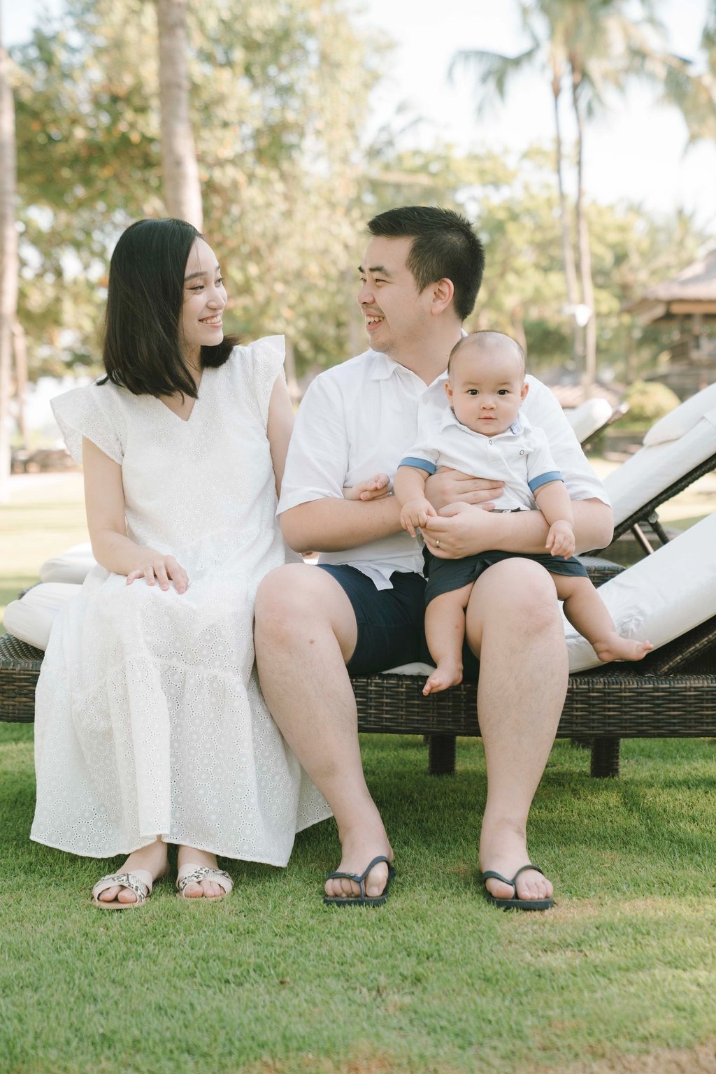 Young family portrait with baby at InterContinental Bali Resort Jimbaran