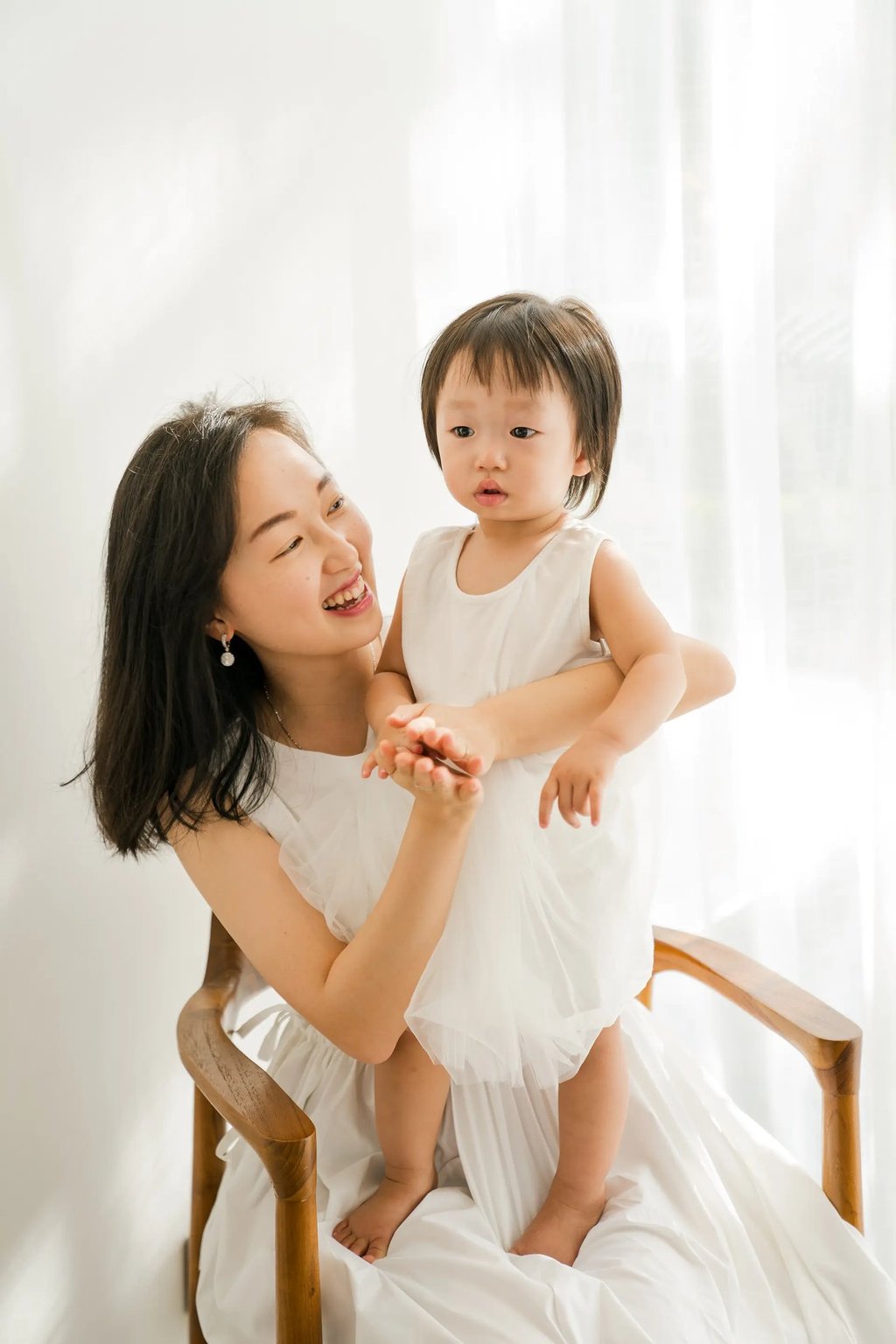 Mother and baby portrait during Stefy family session at Renaissance Uluwatu Bali