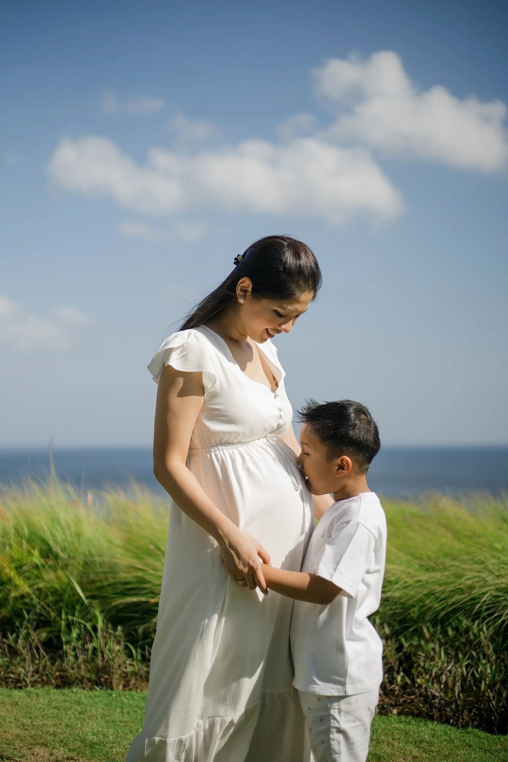 Mother and child sharing a quiet moment during a family session at Anantara Uluwatu.