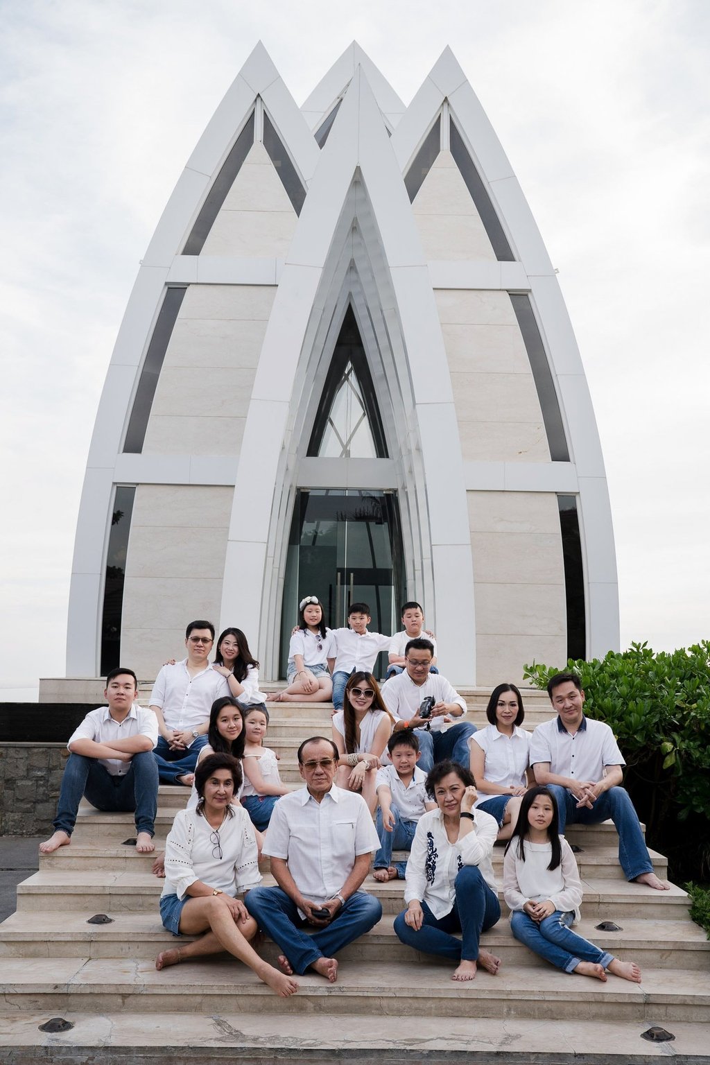 Large multi generation family portrait at The Ritz-Carlton Bali in Nusa Dua during a family photography session