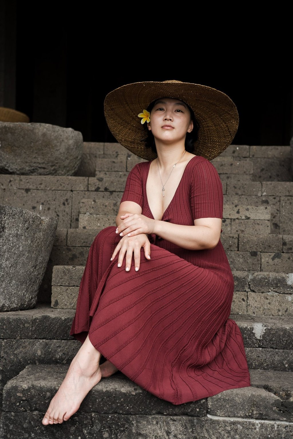  portrait at Bvlgari Resort Uluwatu Bali stone staircase, elegant luxury family photography in Uluwatu