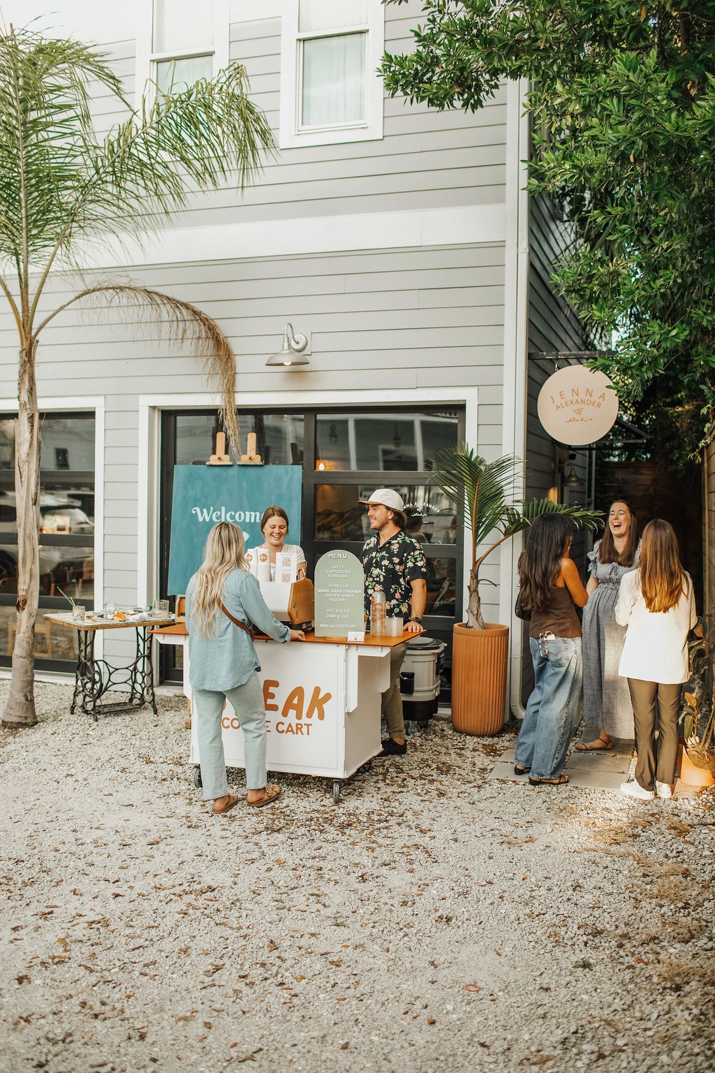 Guests enjoying the five star experience break coffee cart provides for a private event
