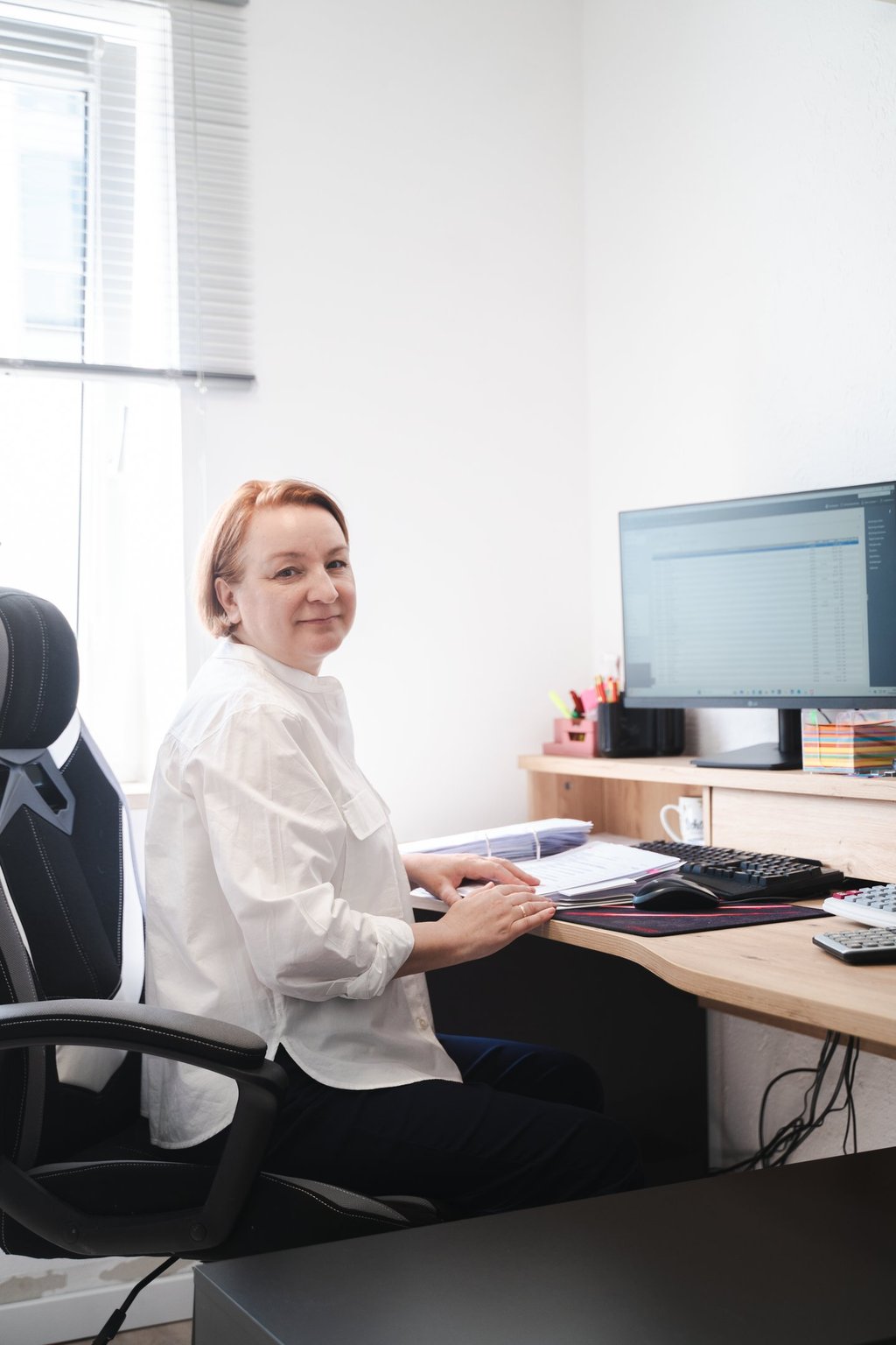 DSM Office Passau – Mitarbeiter bei der Arbeit an Lohn- und Gehaltsabrechnungen