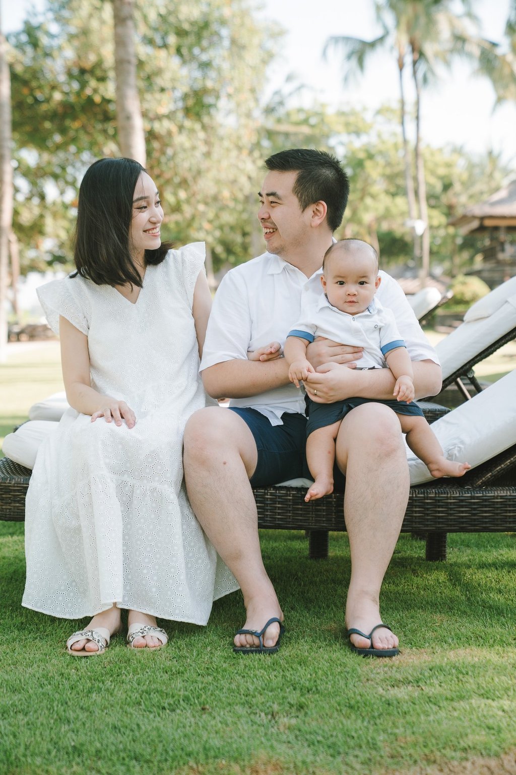 Family relaxing together at Intercontinental Jimbaran captured in a natural and candid Bali family photography session