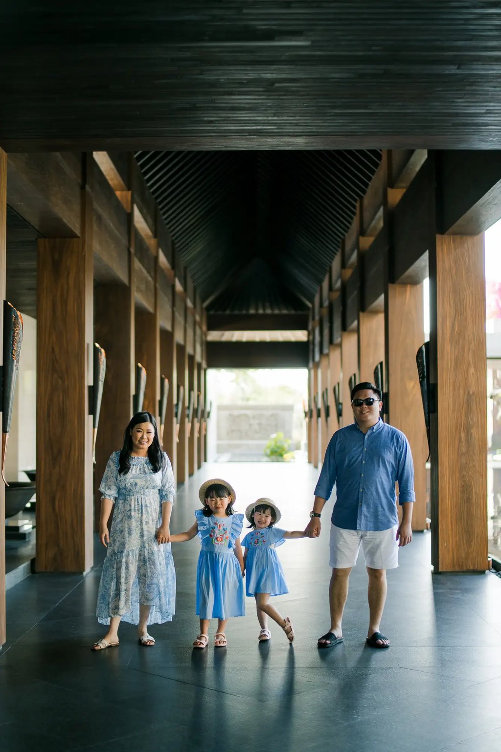 Family walking through the Grand Lobby at The Apurva Kempinski Bali