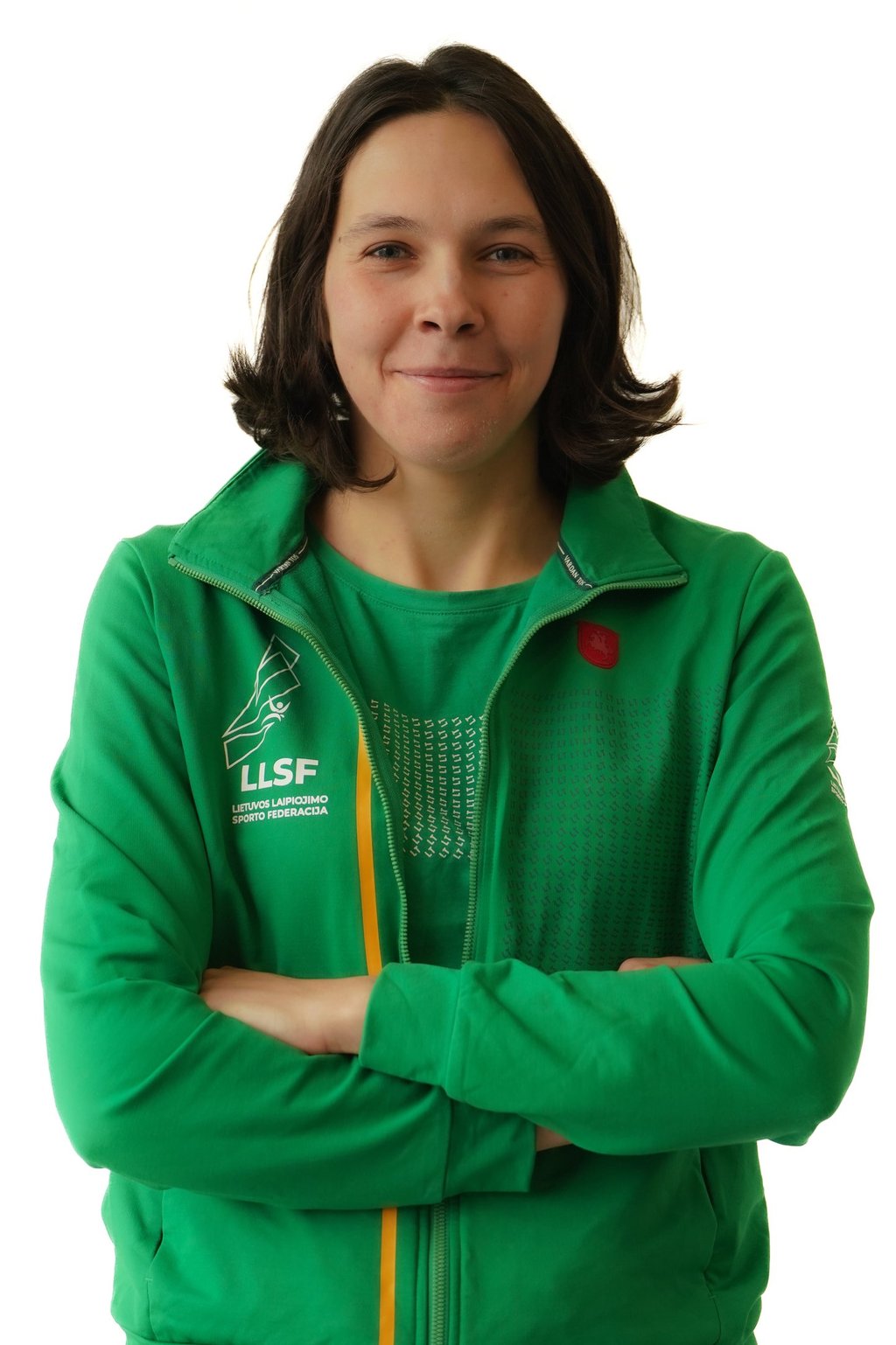 a woman in a green jacket