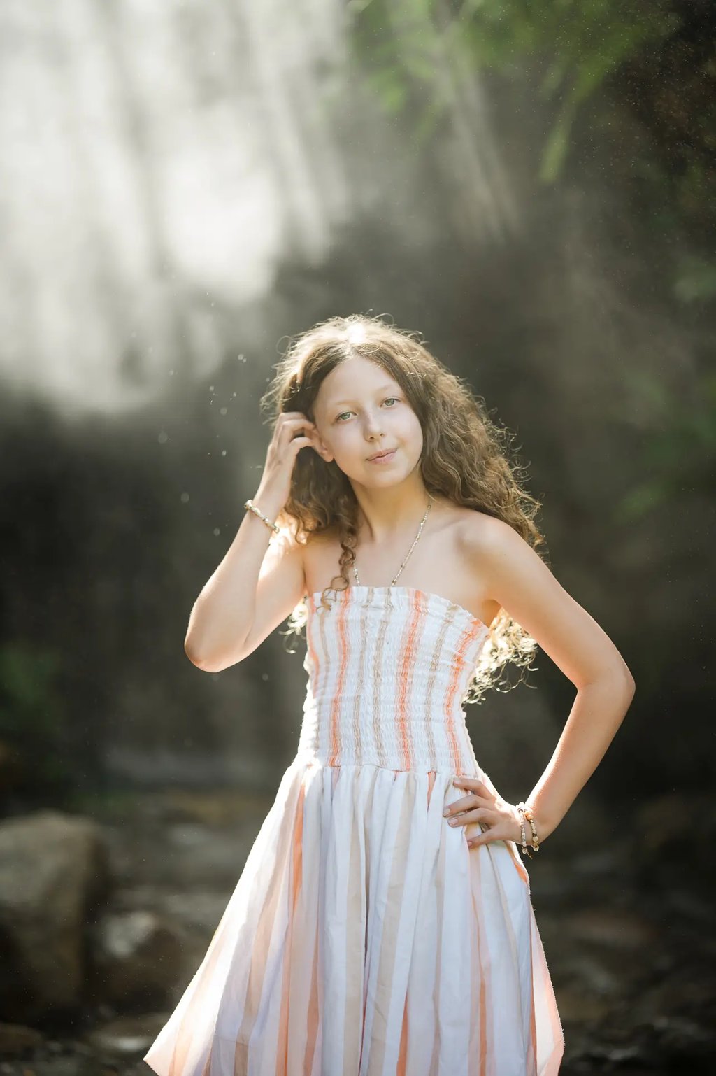 Daughter portrait during a family photography session at Umbul Sari Water Garden in Ubud Bali