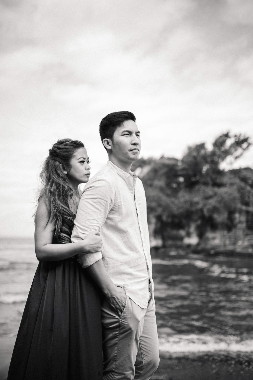 Black and white romantic couple portrait at Tanah Lot Bali.