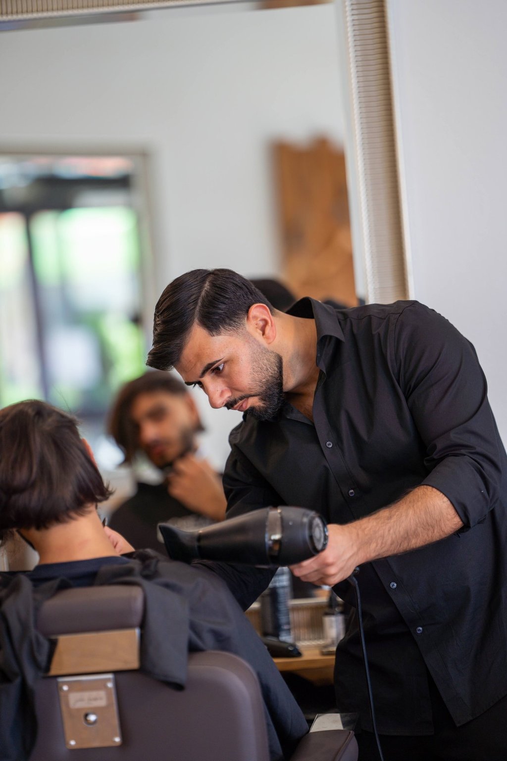 Friseurmeister und Inhaber Simyan Chicho