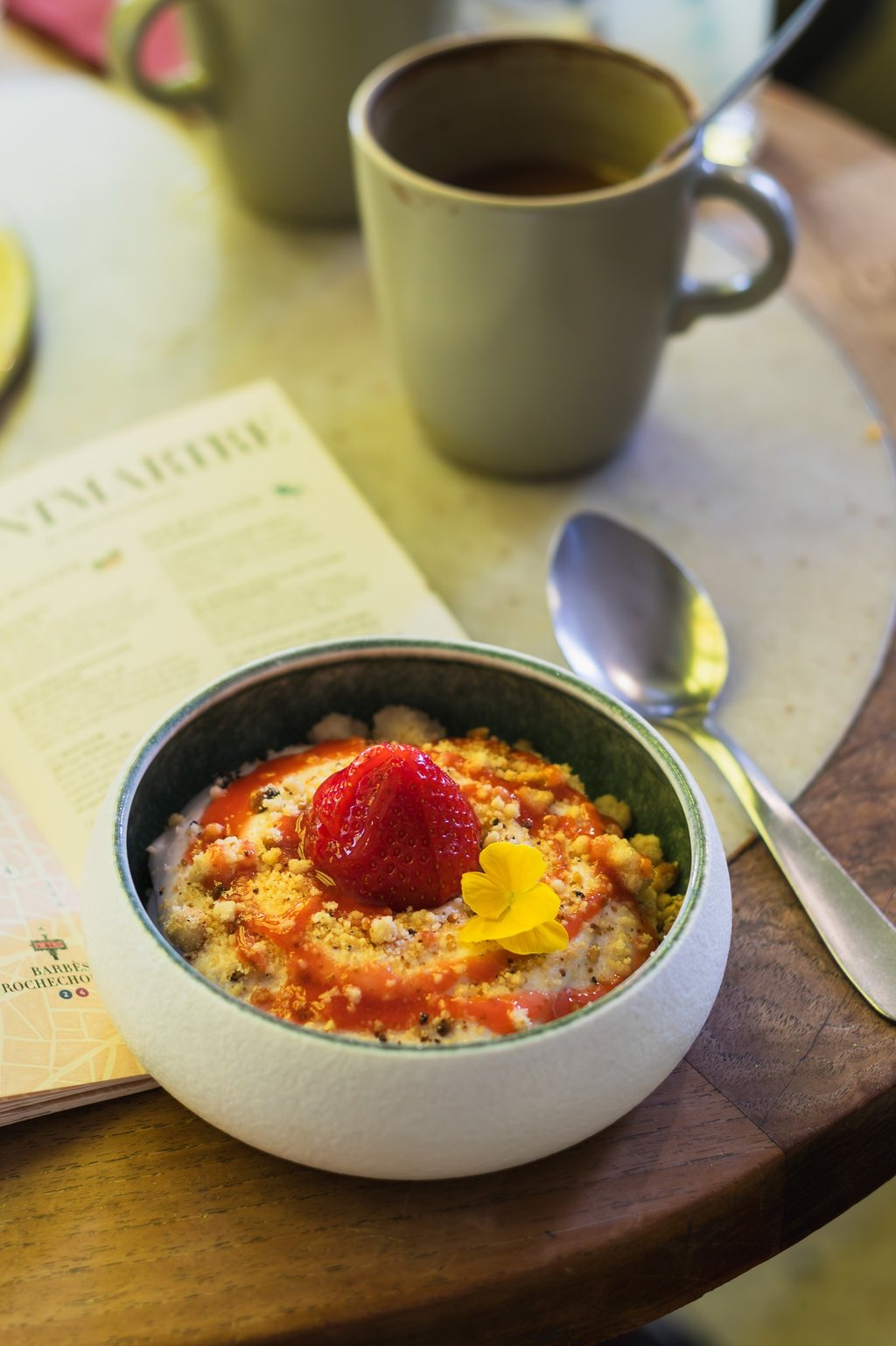 a bowl of oatmeal with a strawberry pie