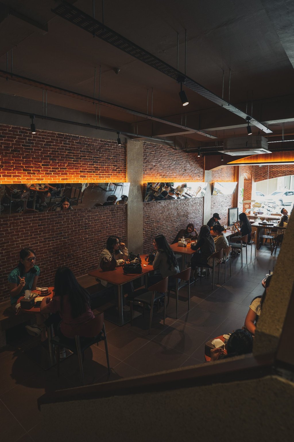 Crowds with brick interior at Joyi Bakes Batam