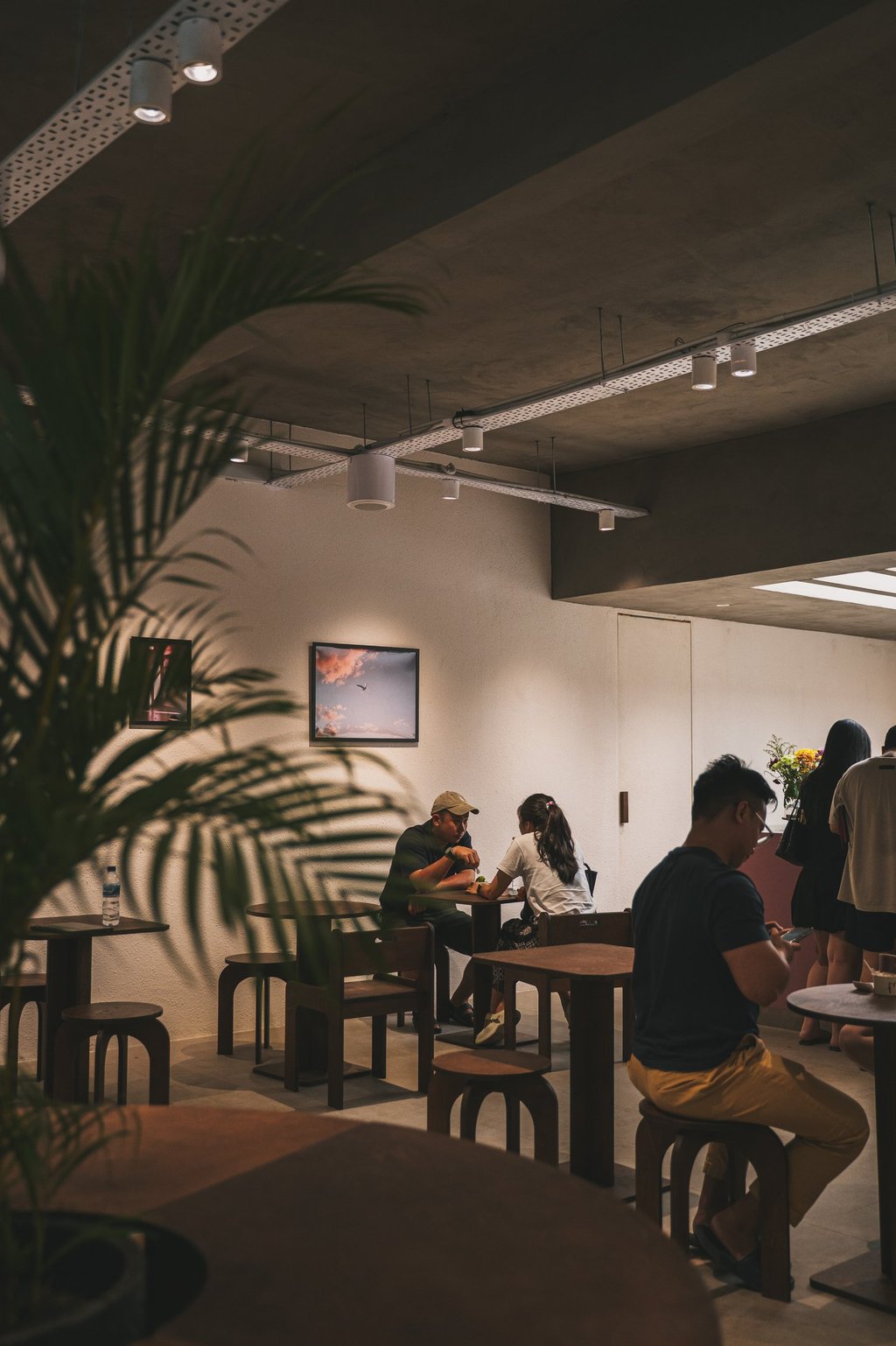 couple sitting at a cafe interior of Frui Batam