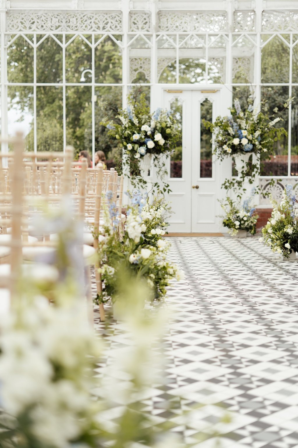 Wedding venue with white and blue flowers