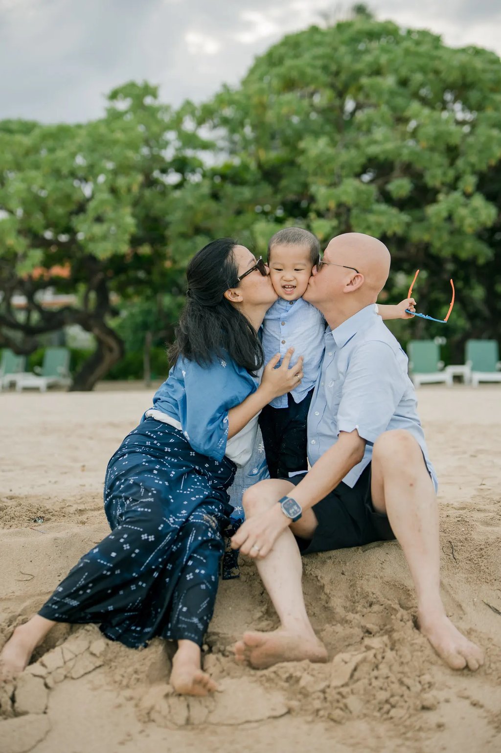 Mother sharing a tender moment with her son during a family session at Nusa Dua Beach Bali