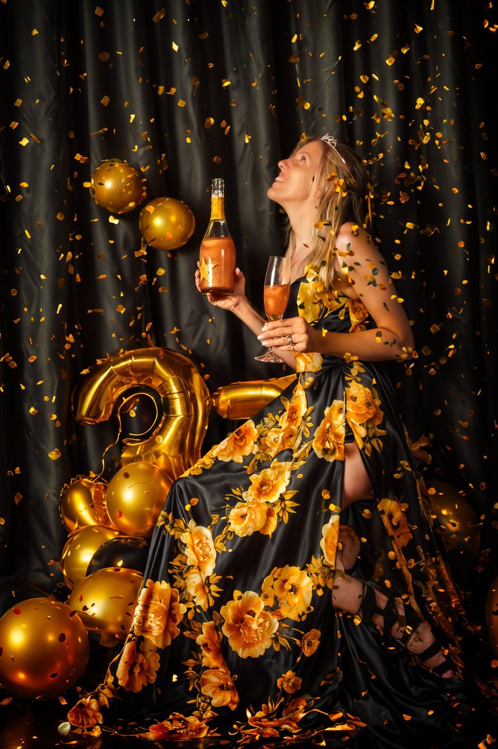 a woman in a dress with a champagne glass