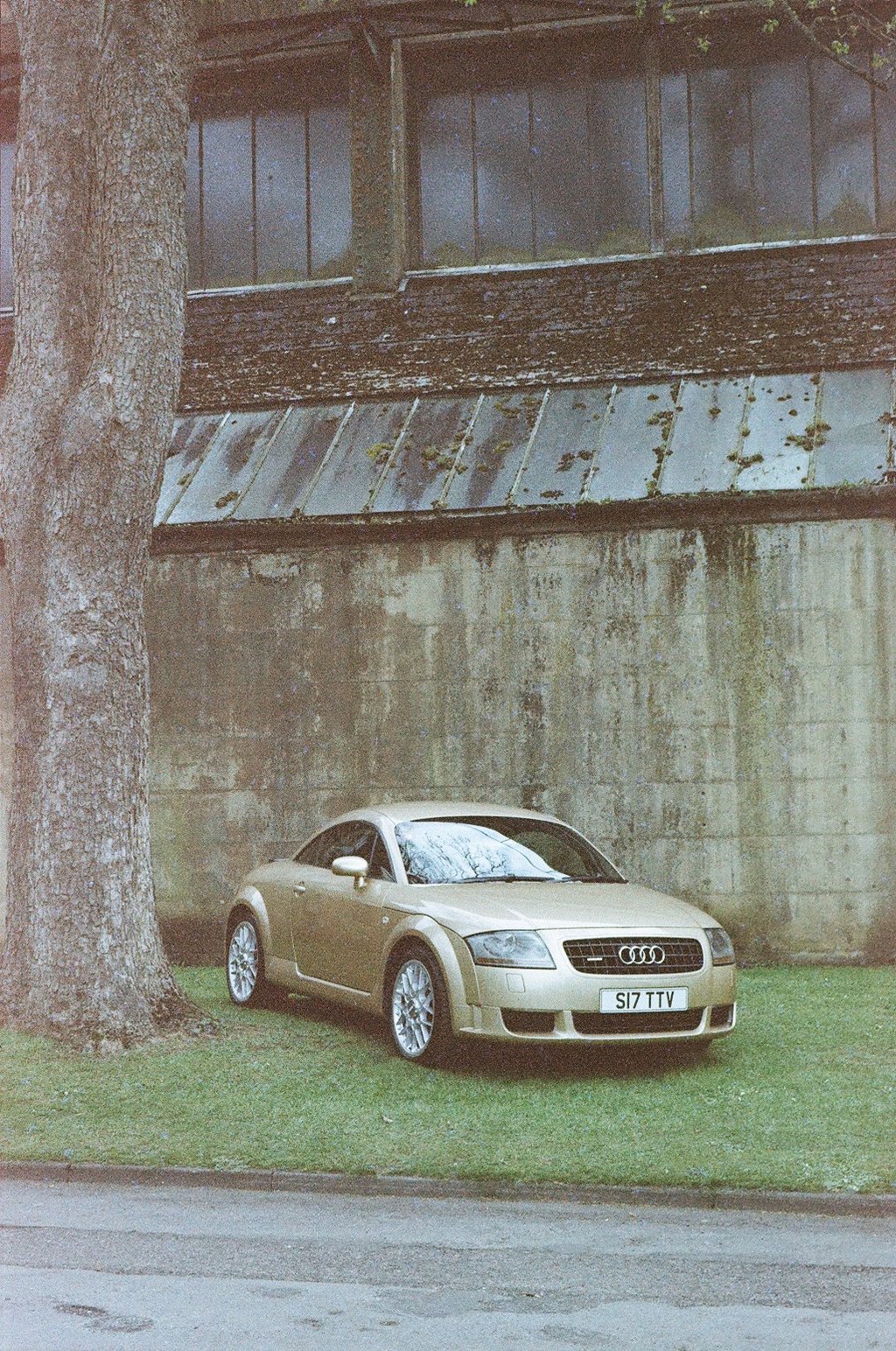 an Audi TT parked on grass 