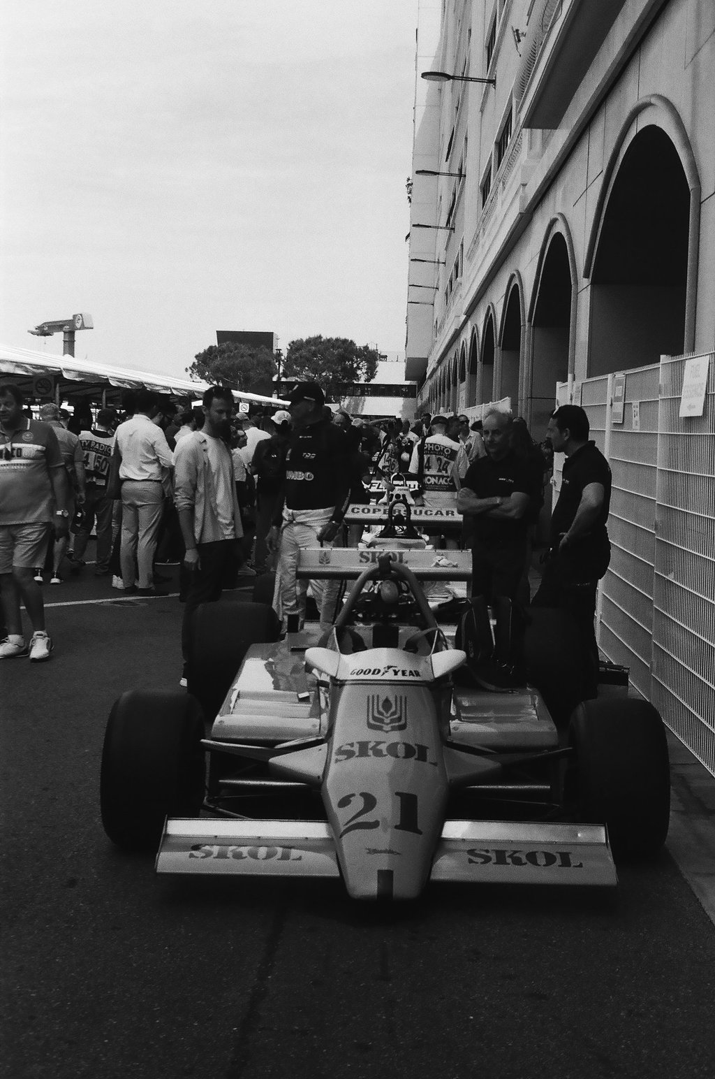 a race car parked in the paddock