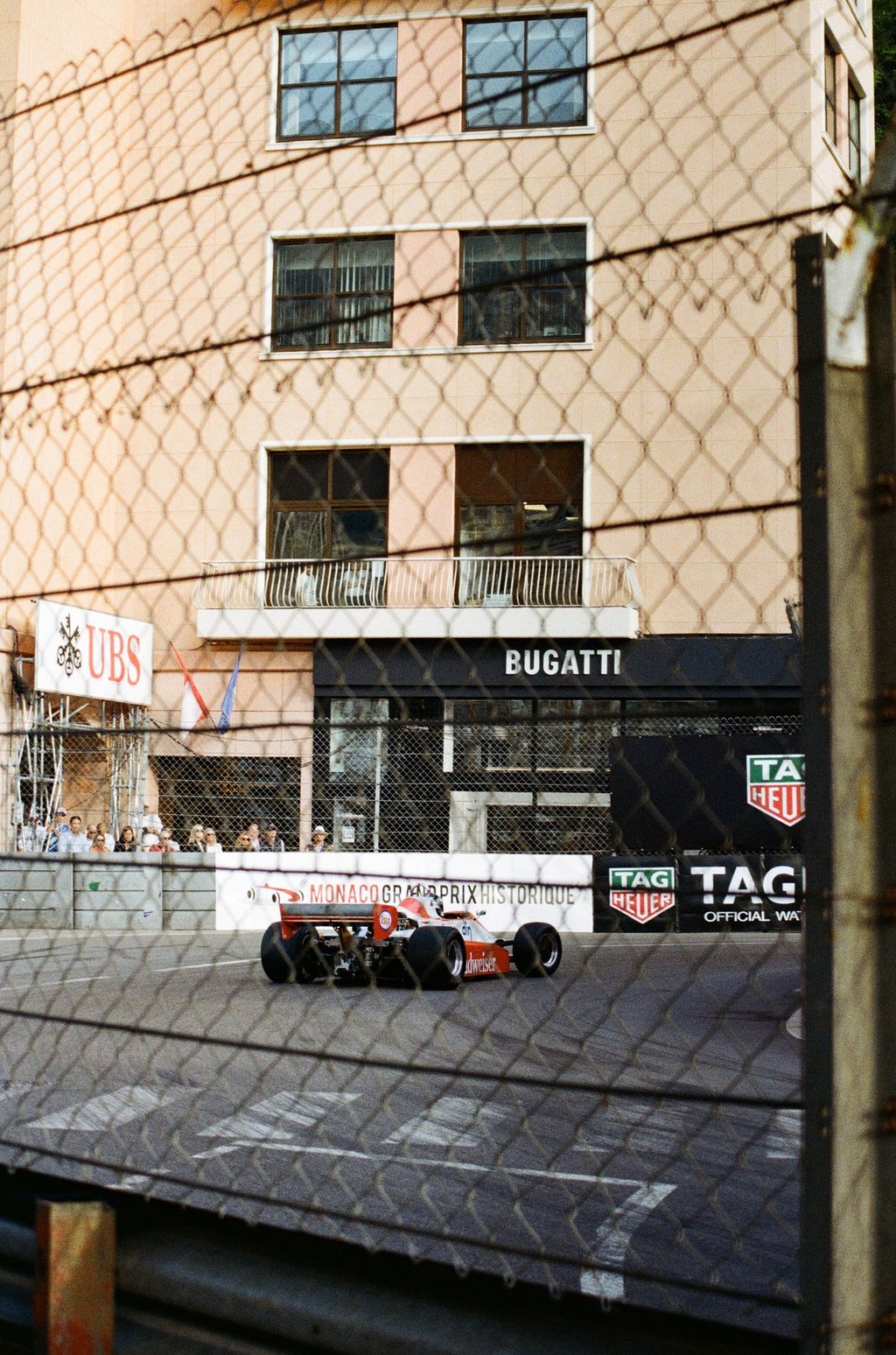 80's Formula 1 car going through La Rascasse corner in Monaco