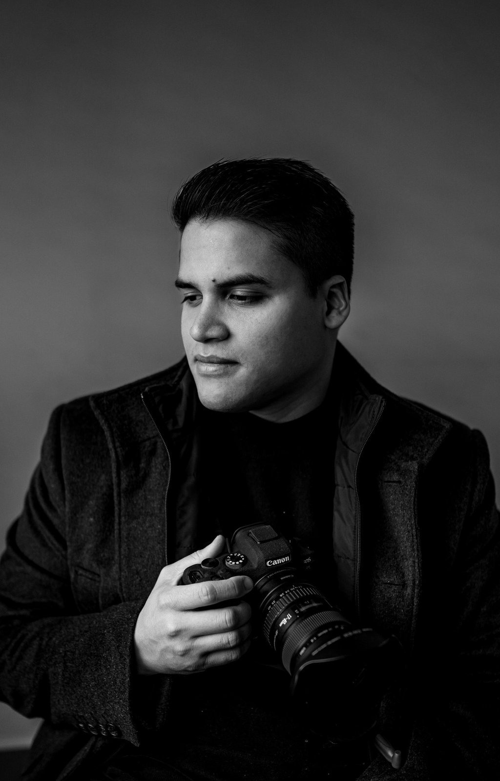 fotografo jorge sulbaran con camara