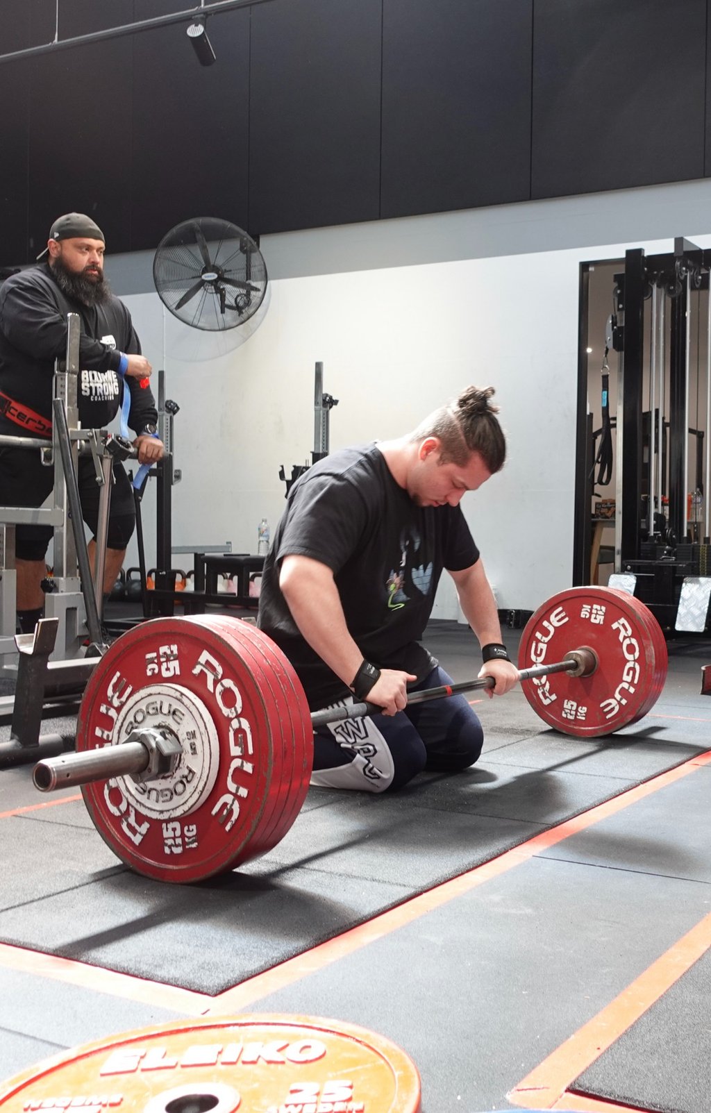 Jackson performing a heavy deadlift at Body Matrix, showcasing his powerlifting technique