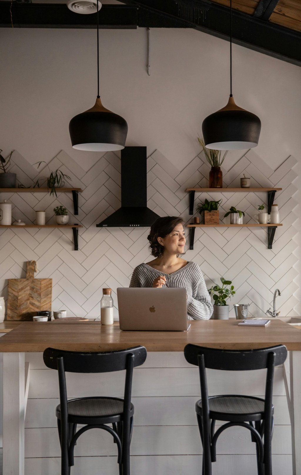 Woman learning affiliate marketing on laptop at home — beginner-friendly setup with notebook and coffee