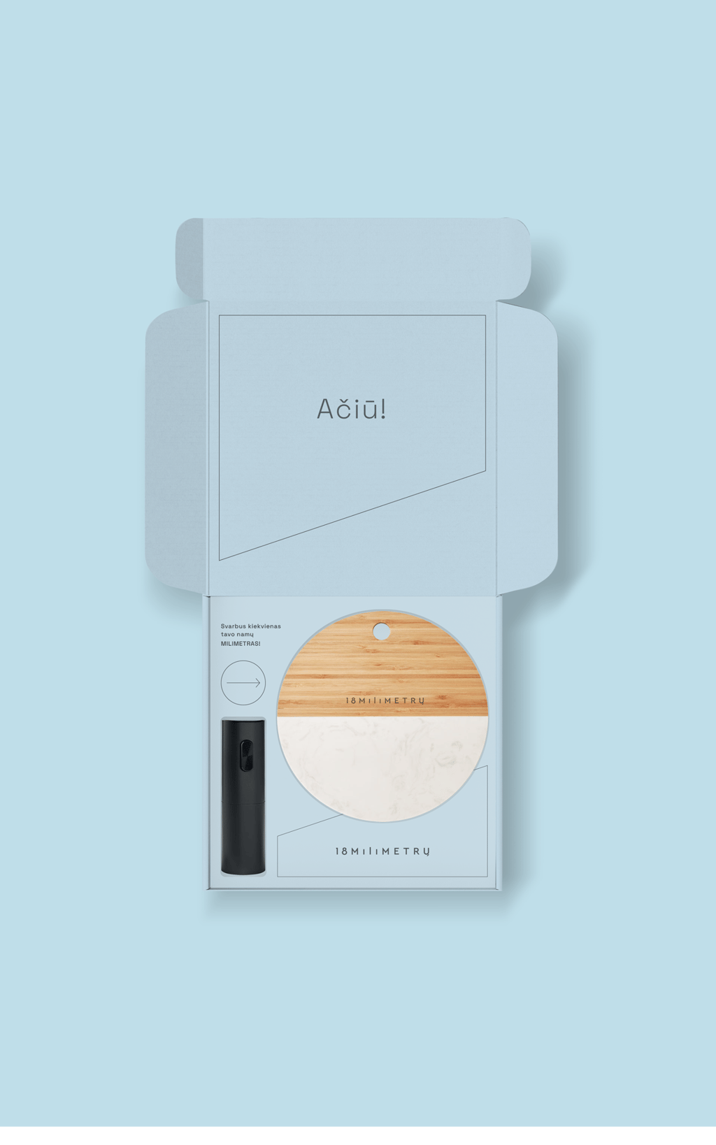 Elegant light blue gift box containing a wooden and marble coaster and black accessory.