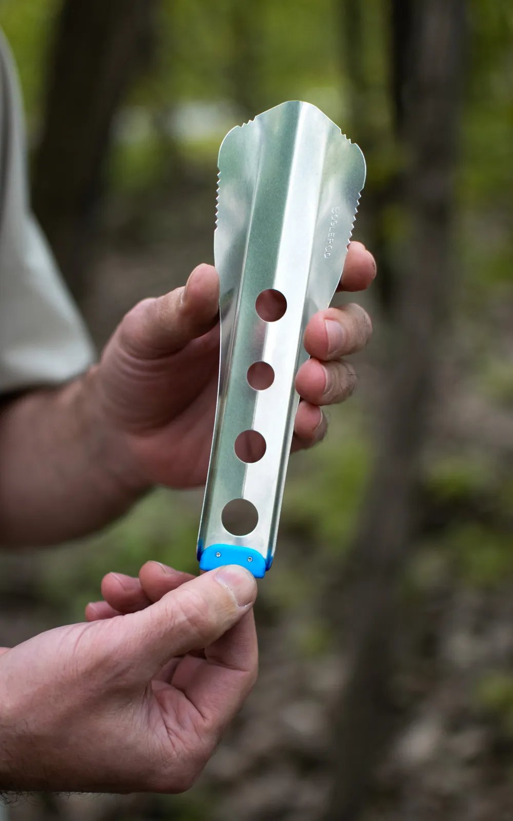 male hands holding boglerco trowel