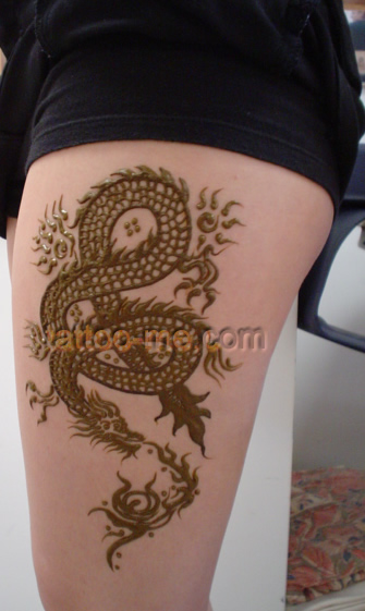 dragon on girl’s thigh
