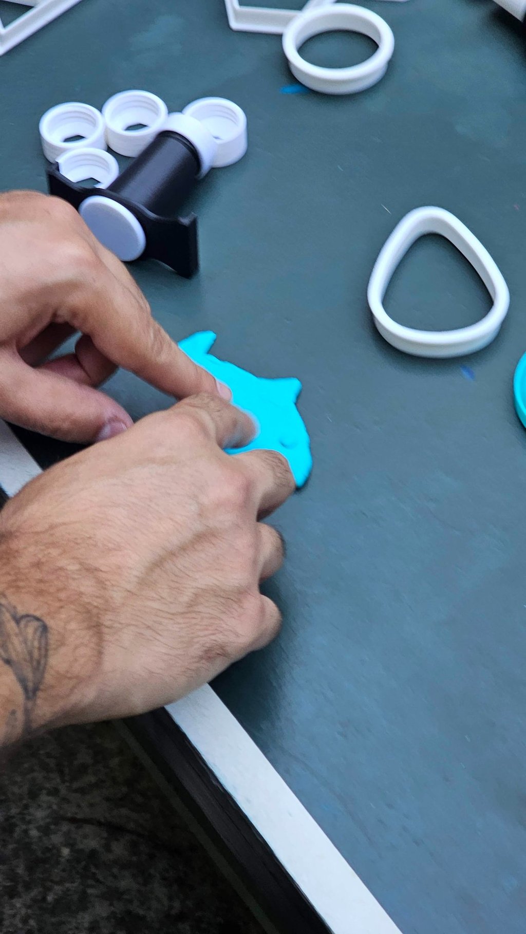 a person is making a craft with scissors and scissors