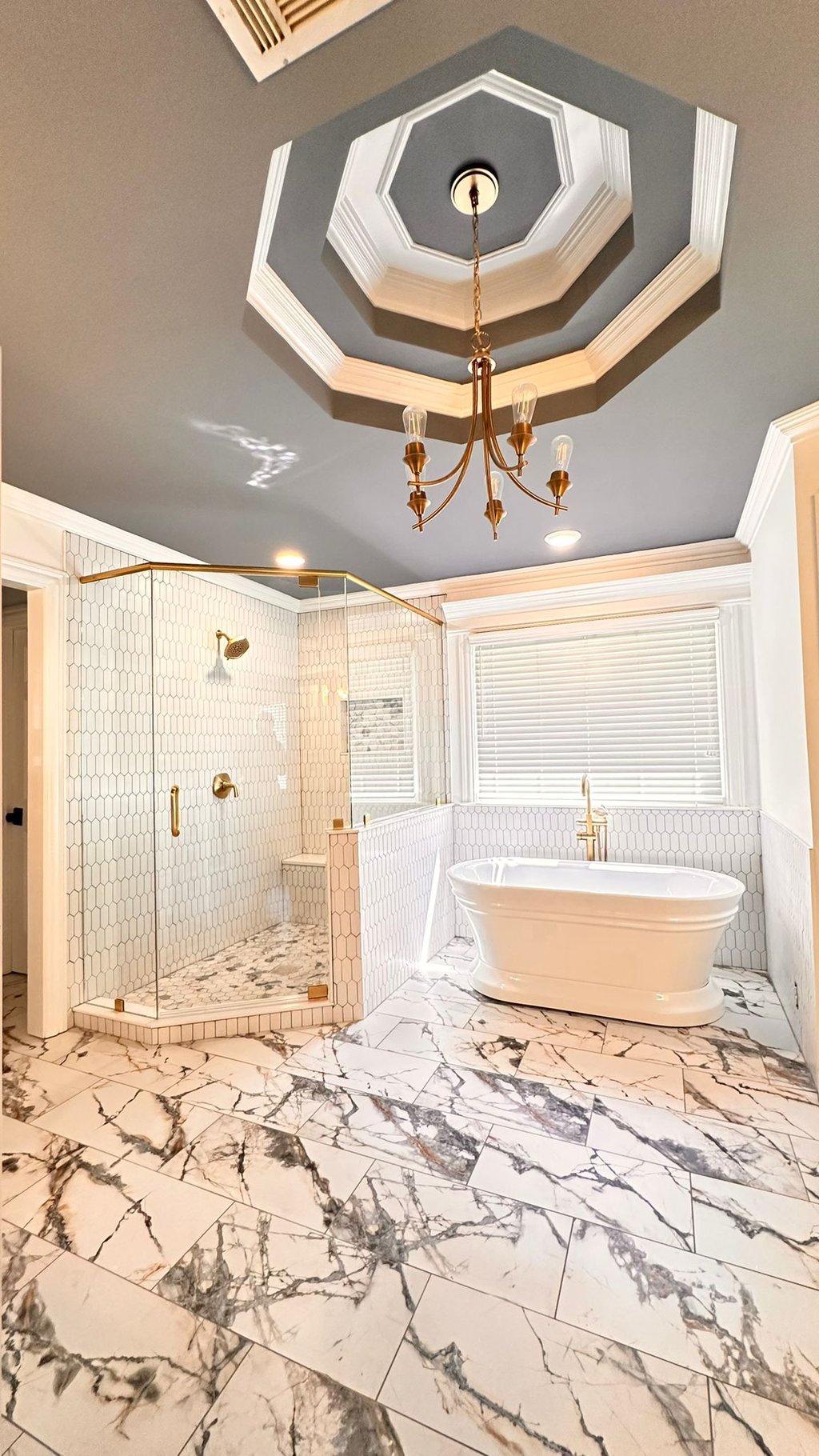 Bathroom upgrade with freestanding tub and glass shower in Marietta, GA