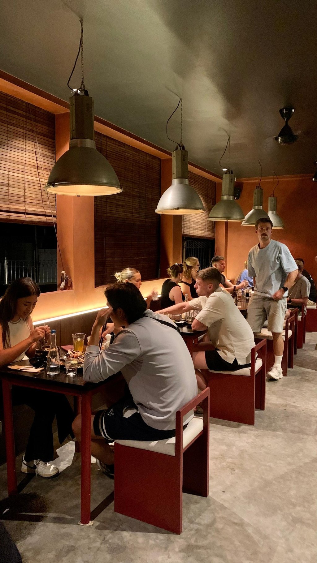 Kenji Ramen Bali Padang Linjong busy dining scene - customers enjoying Japanese food Canggu