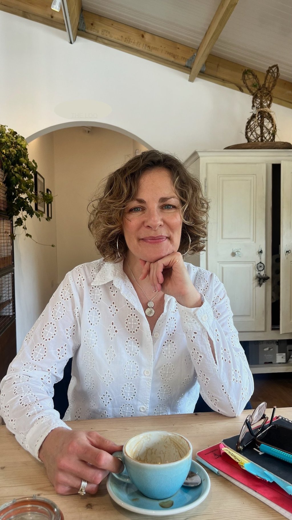 photo of female author in a cafe