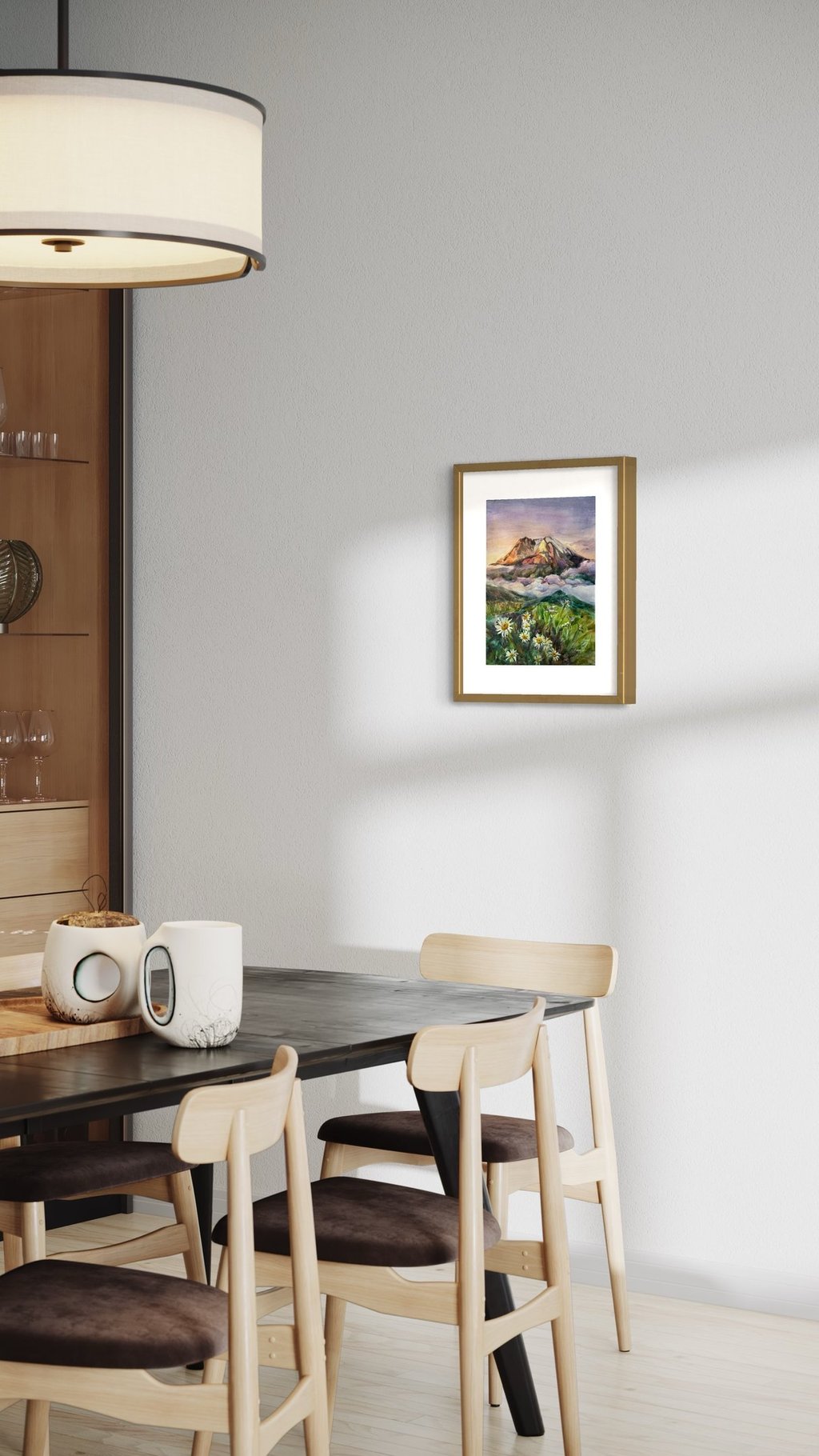 Angela Moiseieva original painting 'Sun-Kissed Peaks' above a dining table.