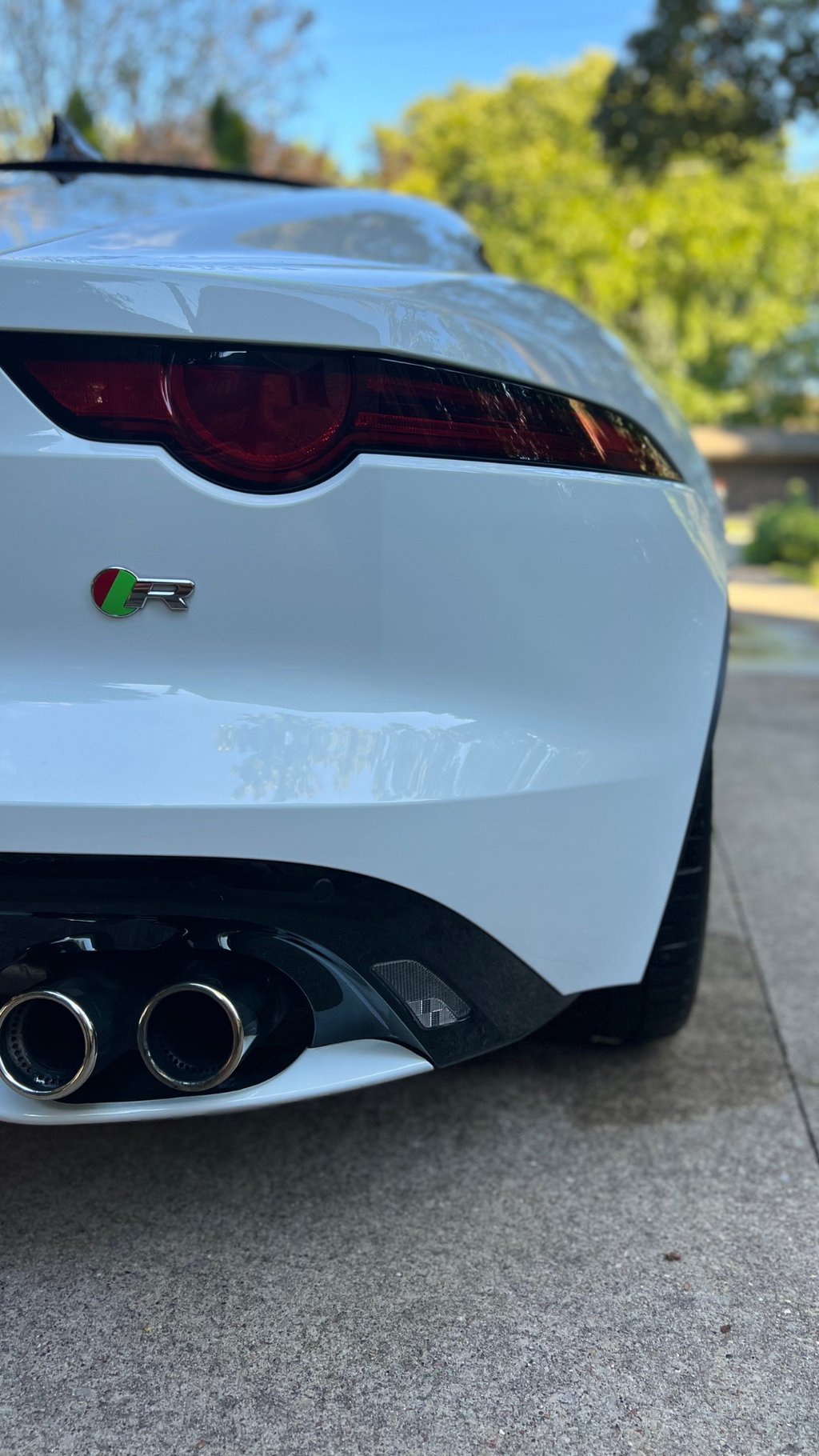 Jaguar F Type sports car glowing after a premium exterior wash and dry service