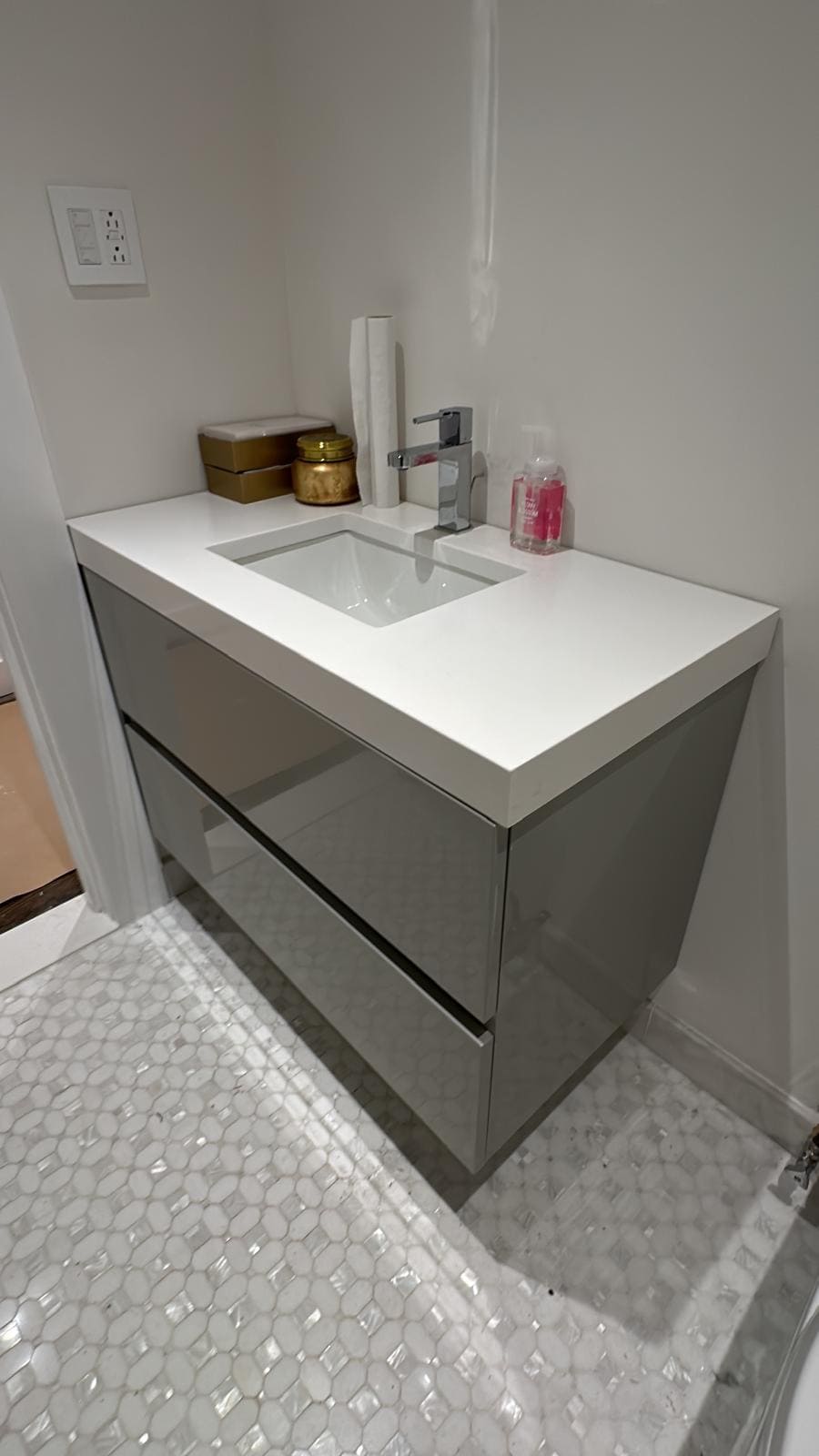 a bathroom with a sink and a toilet
