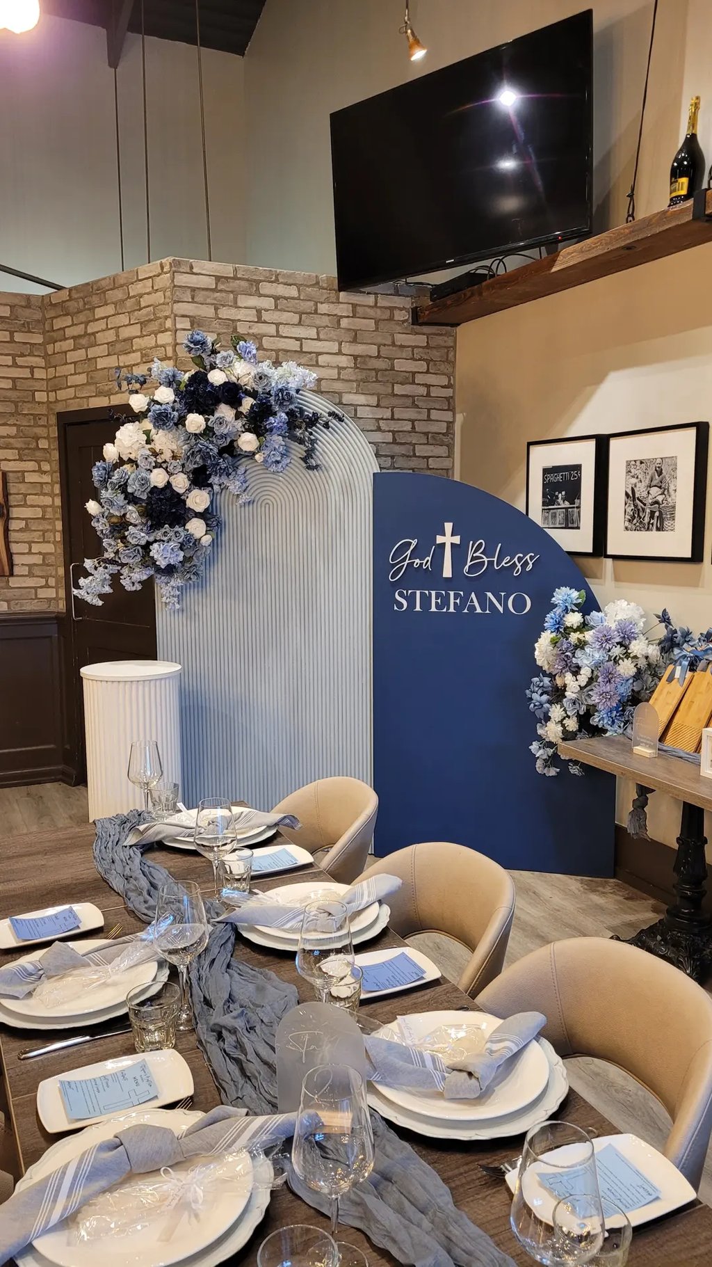 navy blue and baby blue themed baptism with floral arrangements