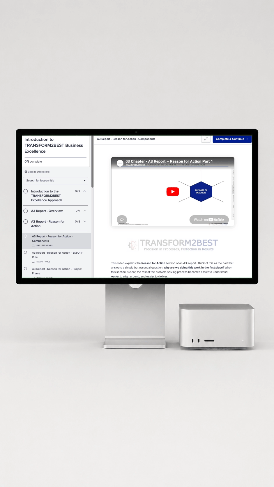 A desktop computer displaying an online business excellence training course on A3 reports.