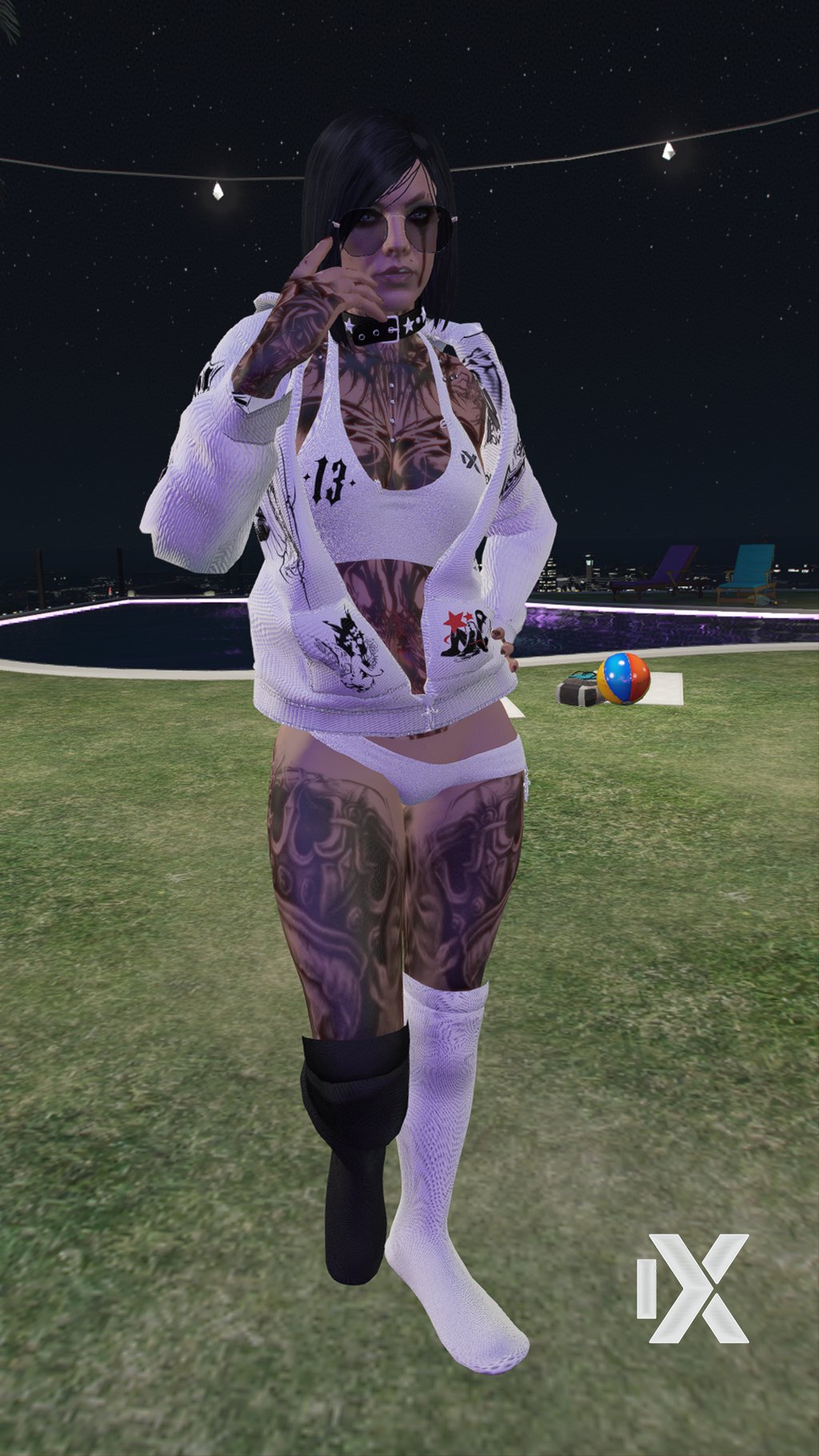 a woman with tattoos on her body and a tattoo on her chest