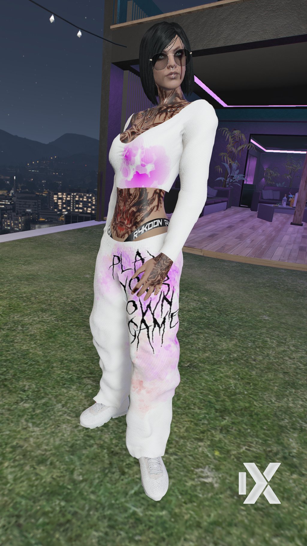 a woman in a white top and pants with a pink shirt