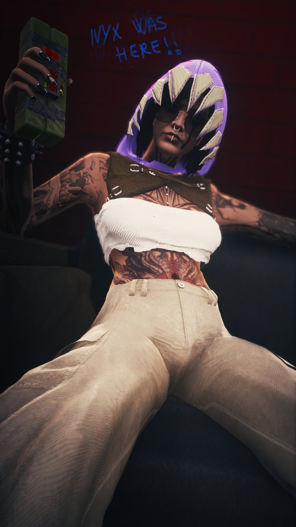 a man with tattoos on his chest and arms