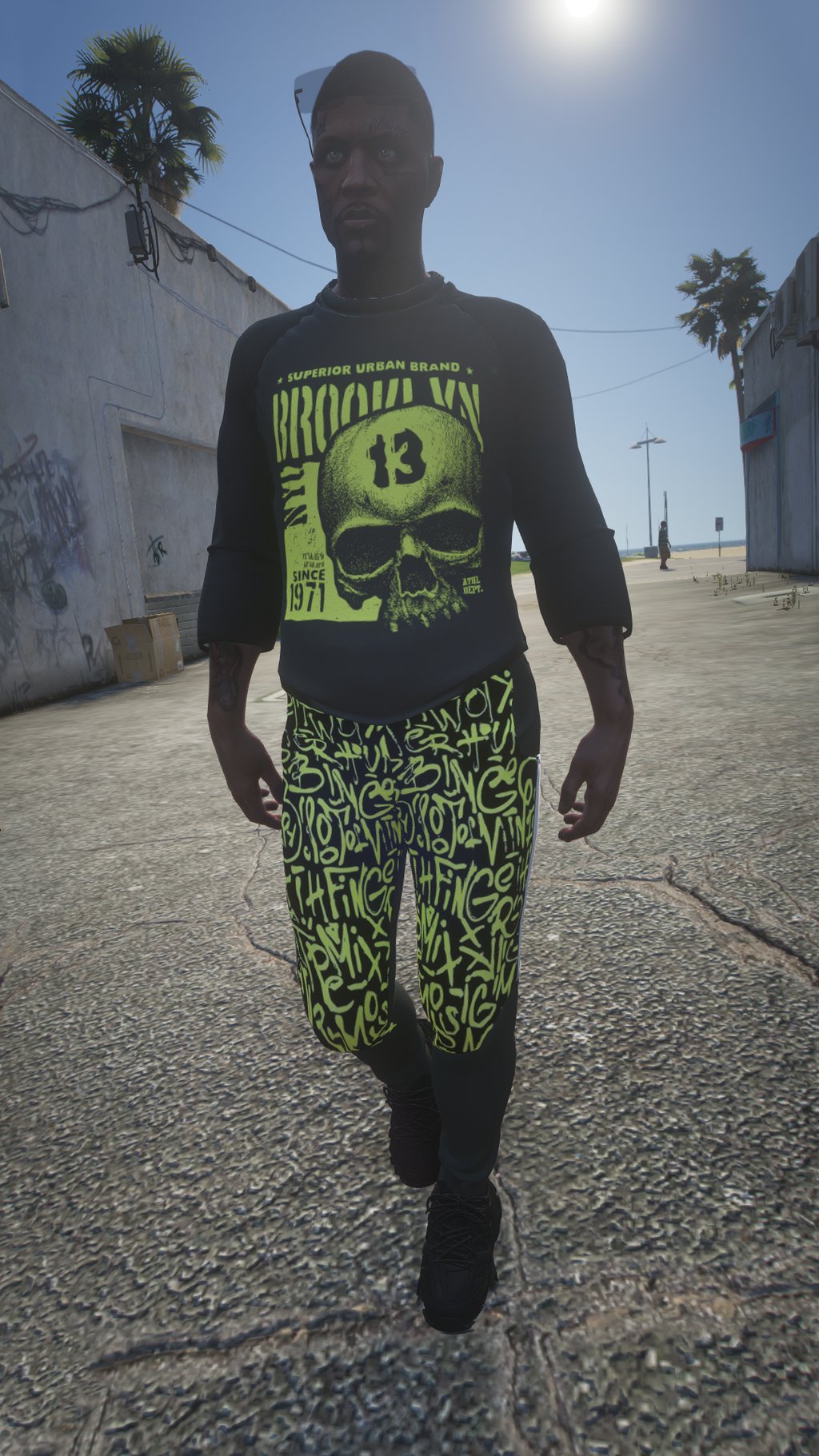 a man in a black shirt and green pants